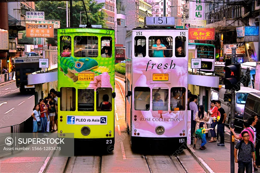 Hong Kong- Doble deck tramways at Wan Chai, Hong Kong.