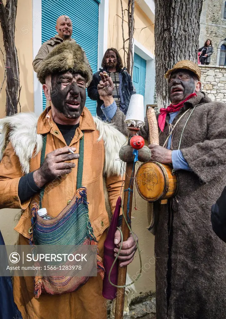 Villagers dressed as goatherds with soot blackend faces take part in a Pagan, rights of spring, festival held in the village of Nedousa in the Taygeto...