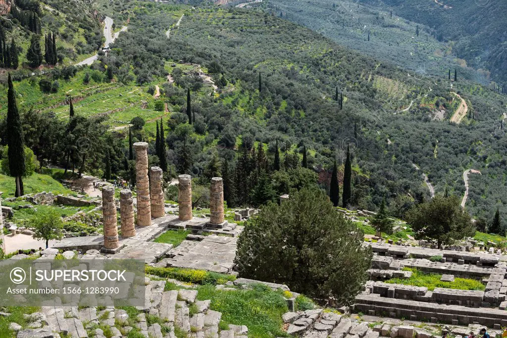 Looking down on the Temple of Apollo and the theater at the ancient site of Delphi in Thessaly, Central Greece.