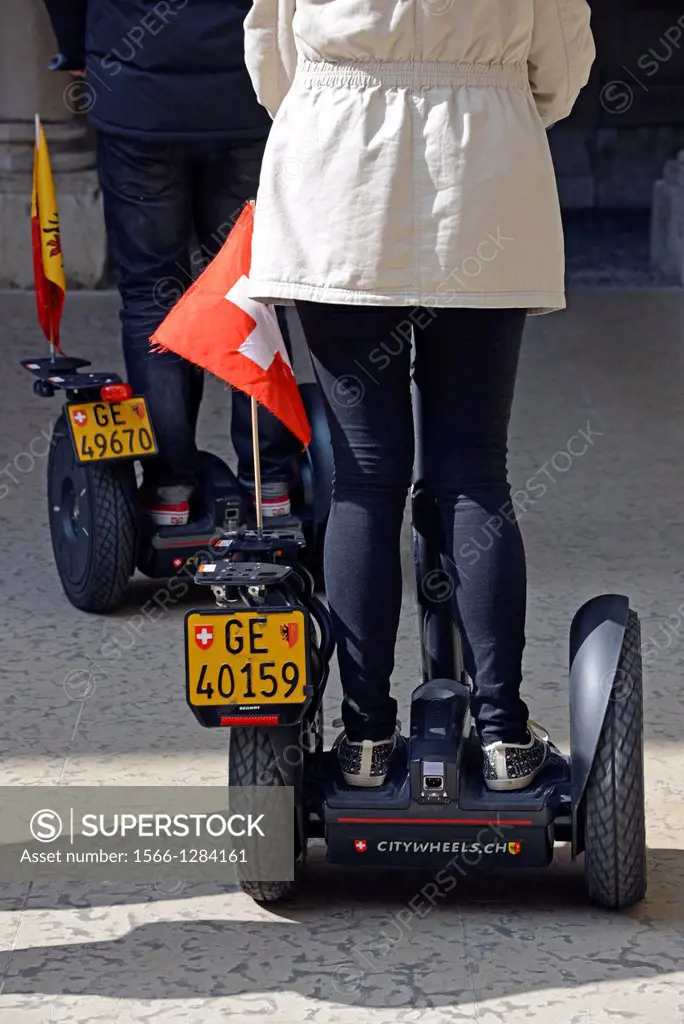 new way of touristic sightseeing on Segway, two-wheeled, self-balancing electric vehicle invented by Dean Kamen, Geneva, Switzerland