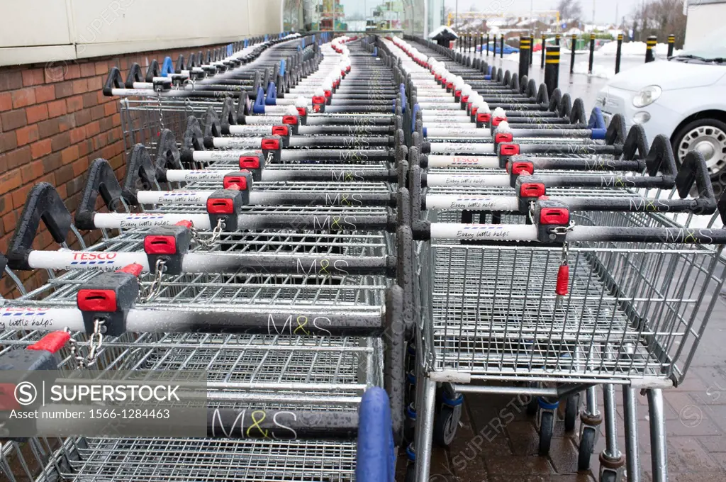 Shopping trolleys, Bloomfield Shopping Centre, Bangor, Northern Ireland. Winter - some snow visible.
