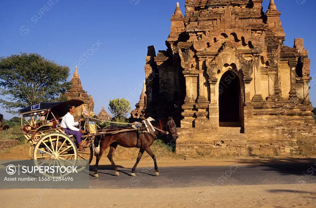 Horse-drawn carriage in front of a pagoda in Bagan