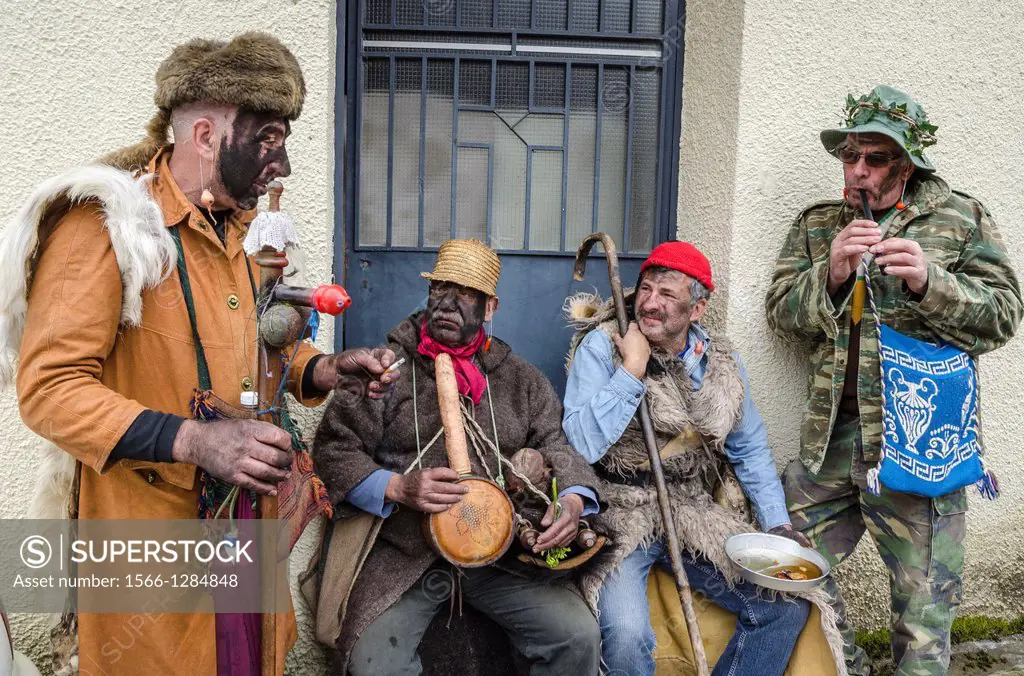 Villagers dressed as goatherds with soot blackend faces take part in a Pagan, rights of spring, festival held in the village of Nedousa in the Taygeto...