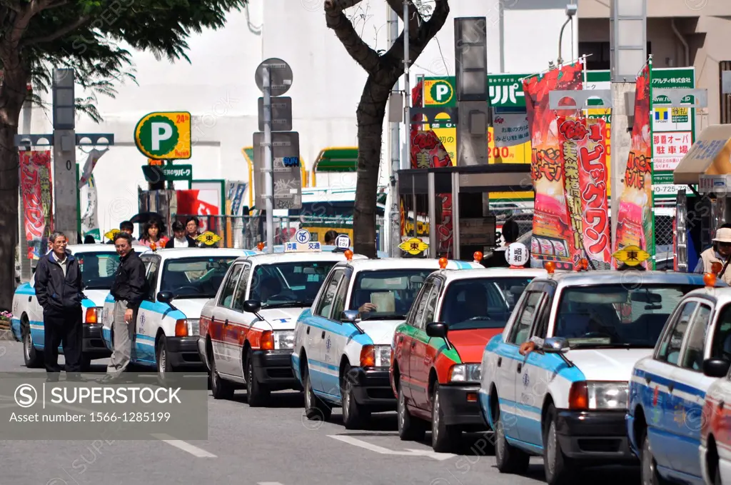 Naha, Okinawa, Japan, long line of taxis along Okiei-dori, on Sunday