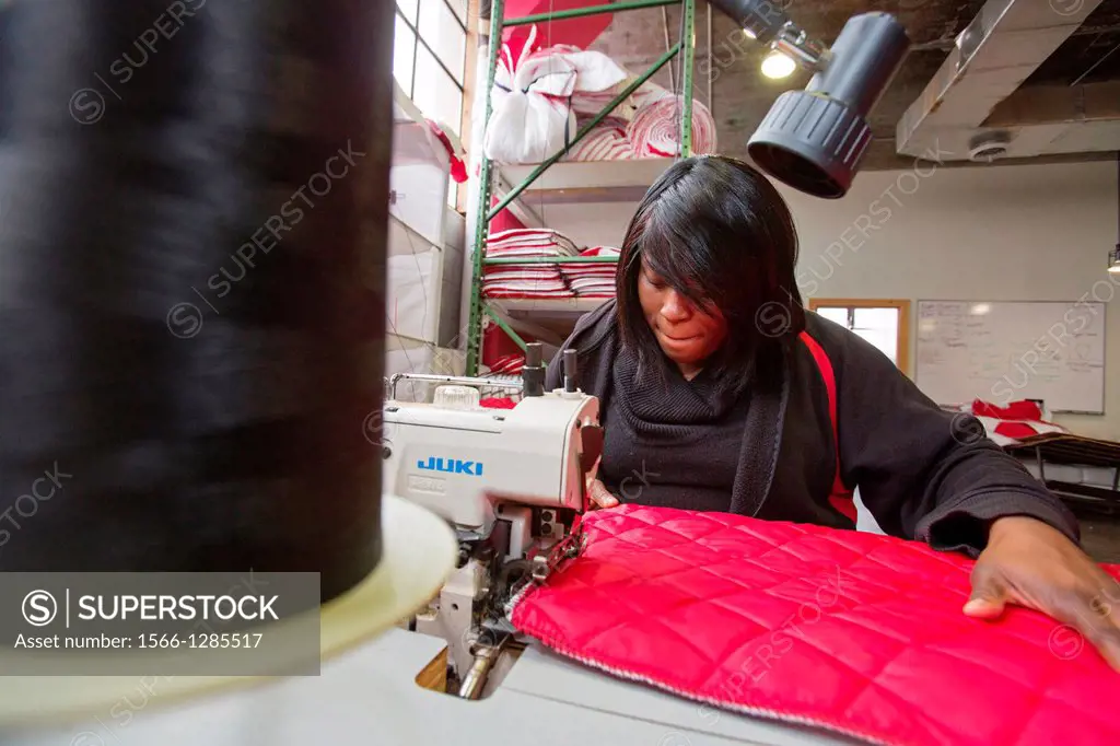 Detroit, Michigan - Women sew coats for the homeless at the nonprofit Empowerment Plan. The organization hires homeless women as seamstresses. Their c...