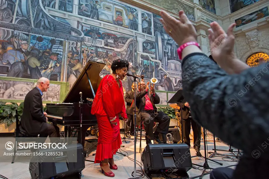 Detroit, Michigan - Bill Meyer's Detroit New Orleans Band performs in the Rivera Court at the Detroit Institute of Arts. On the walls are the Detroit ...