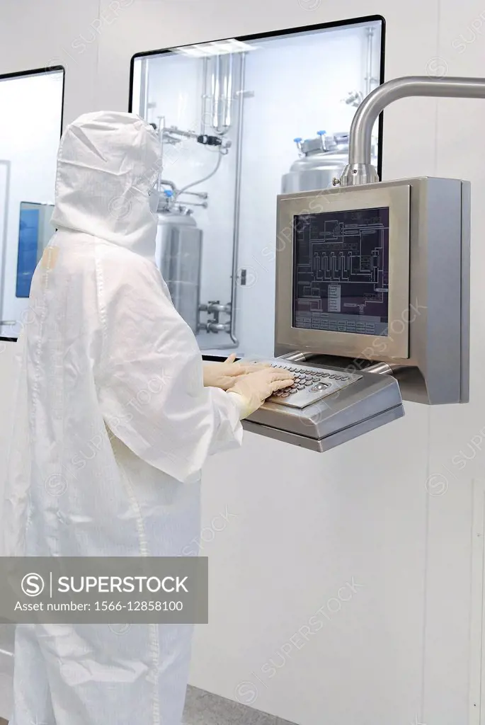 Worker in Clean Room suit at a Pharmaceuticals manufacturing plant.