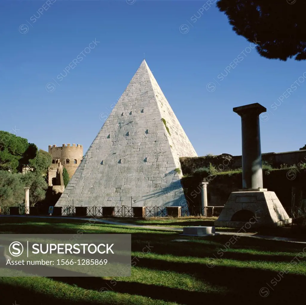 Rome. Italy. Piramide di Cestio. The white memorial pyramid of Caius Cestius set in the Aurelian Wall.