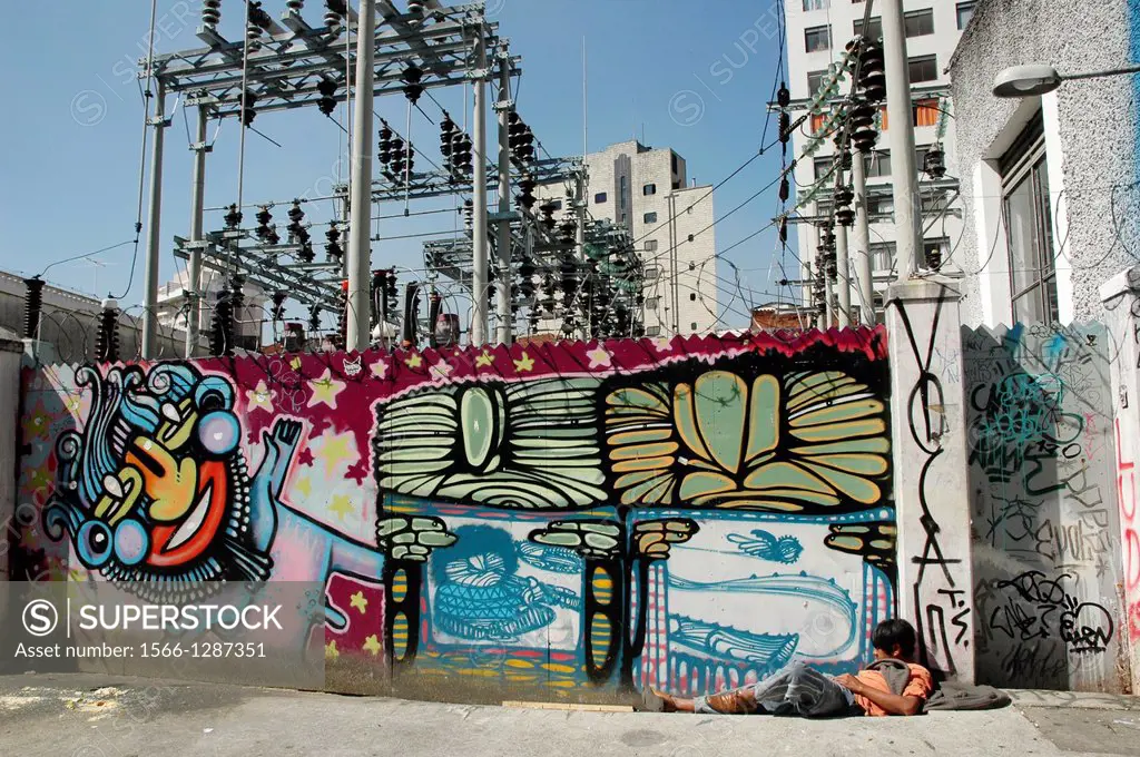 Sío Paulo, Brazil, homeless man, graffiti, electricity poles and condos along the Rua Augusta