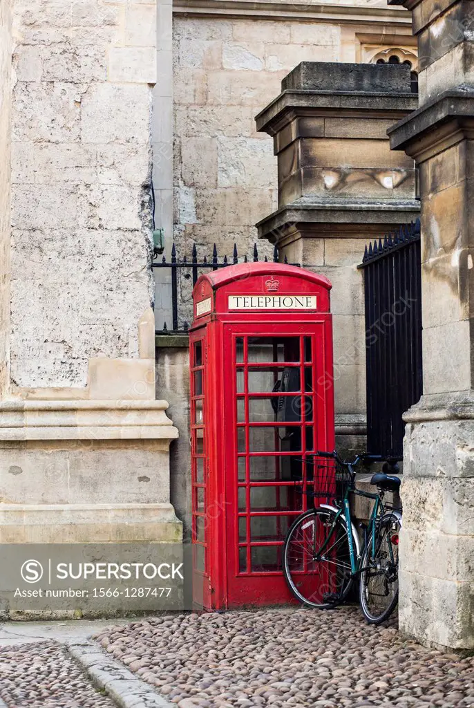 Typical red telephone Booth with a bike parked, Oxford, UK