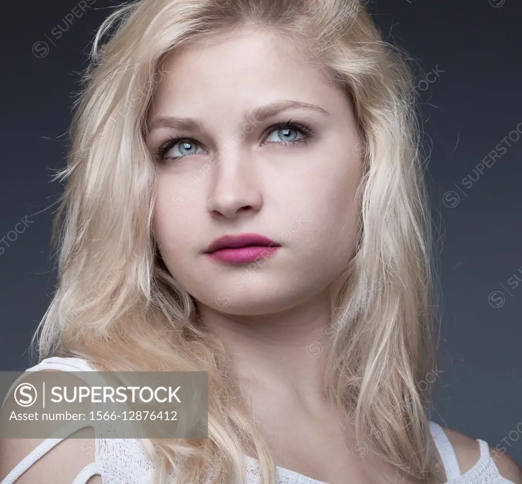 Portrait of a russian young teen model with blue eyes.