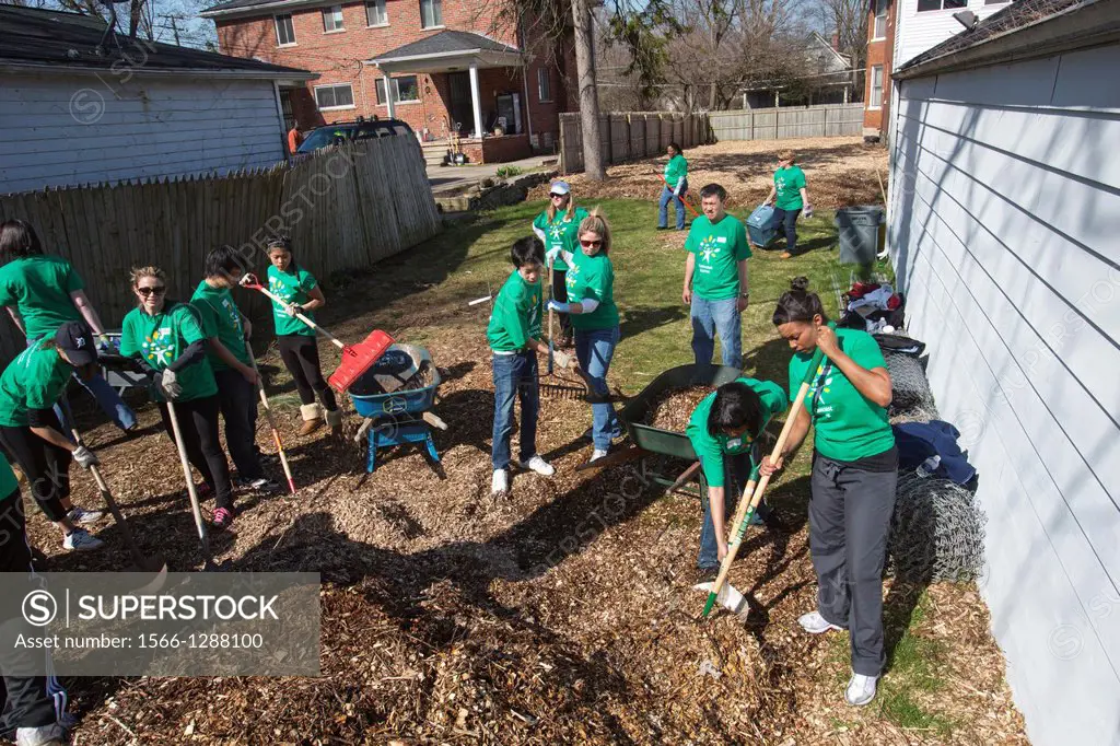 Detroit, Michigan - Volunteers from Comcast prepare the ground for a community garden. The garden is being developed by Motor City Blight Busters, an ...