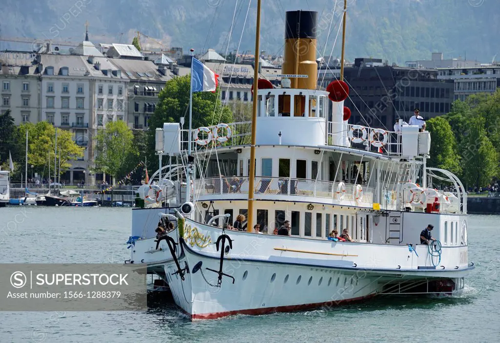 Swiss historic steamboat, regular cruises on Geneva Lake, Lac Leman, Switzerland, cityscape of city of Geneva in the background, Geneva, Switzerland