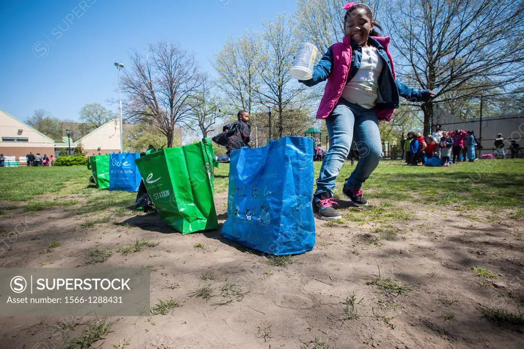 First and second graders from neighborhood schools celebrate Arbor Day playing recycling relay games in Herbert Von King Park in the Bedford-Stuyvesan...