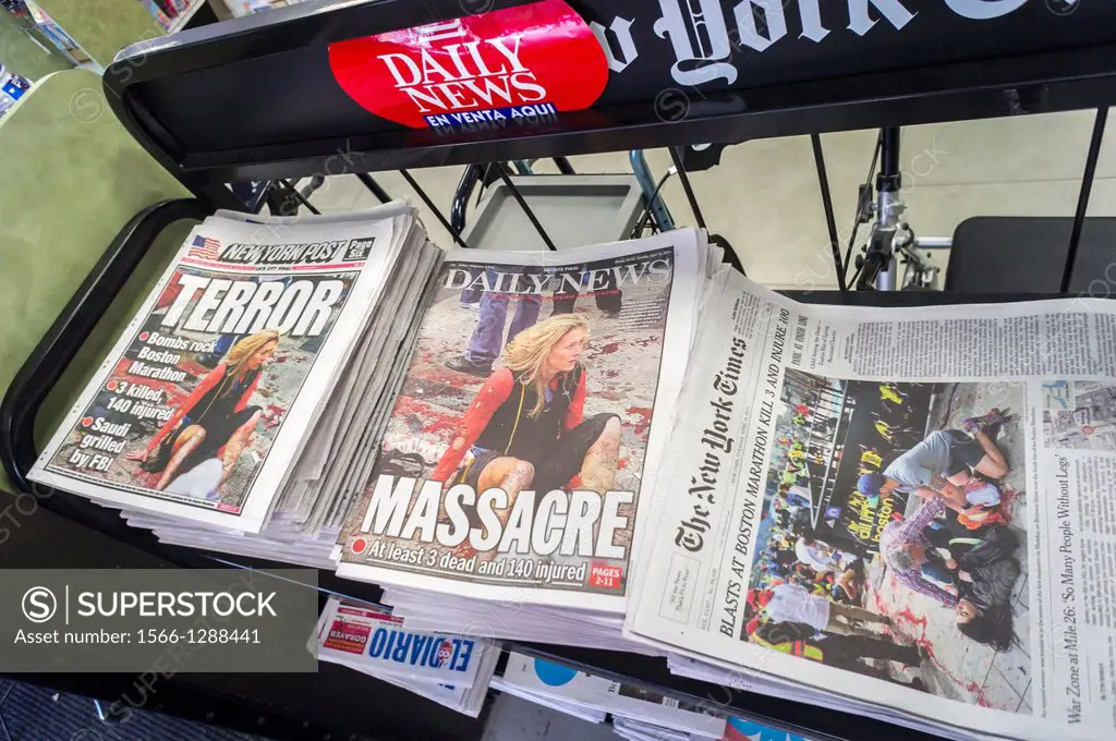 Newspapers at a newsstand in New York on Tuesday, April 15, 2013 report on the previous days alleged terrorist bombing at the finish line of the Bosto...