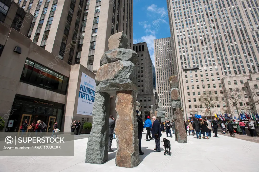 Visitors to Rockefeller Center walk amongst the ´´Human Nature´´ installation by the artist Ugo Rondinone. The nine human-shaped bluestone figures sca...