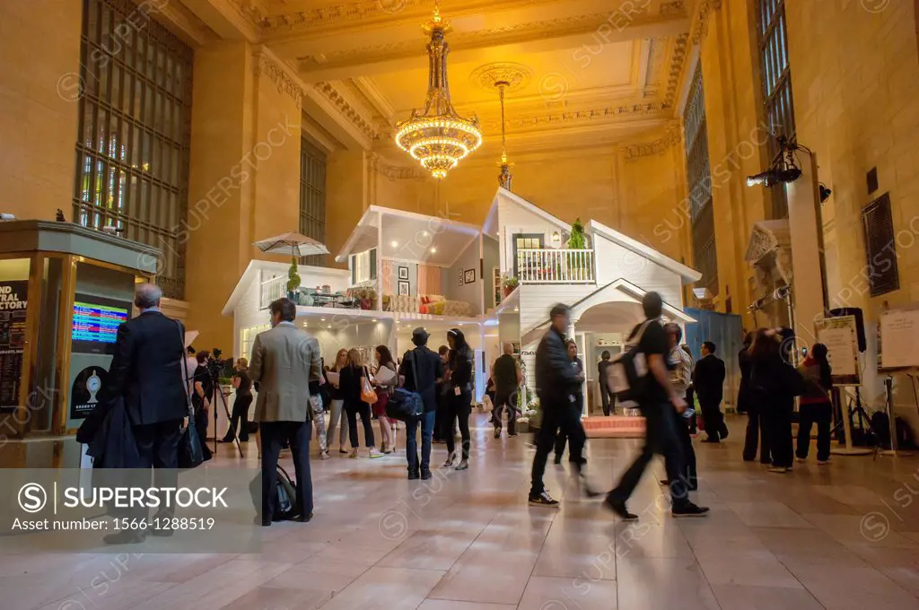 Visitors to Grand Central Terminal stand in awe at Target´s two-story, 1, 540 square foot ´´dollhouse´´ constructed in Vanderbilt Hall. The house incl...