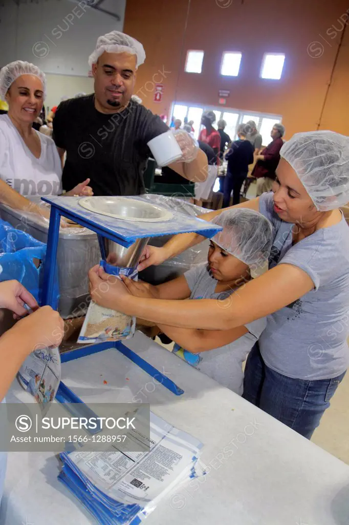 Florida, Miami, Miami-Dade County Fair And Expo, Feed My Starving Children, volunteer, community service, packing, meals, Hispanic, man, father, woman...