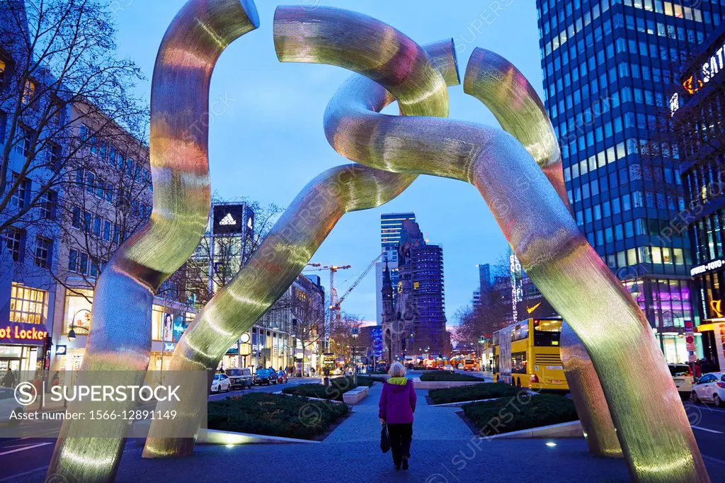 The Kaiser Wilhelm Gedächtniskirche, Emperor Wilhelm Memorial church, in front sculpture called Berlin by Brigitte Matschinsky-Denninghoff and Martin ...