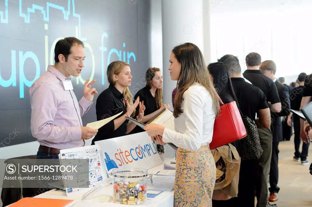 Job seekers attend the Fourth Annual NYC Startup Job Fair in New York. The Labor Department reported a rise in unemployment benefit applications for l...