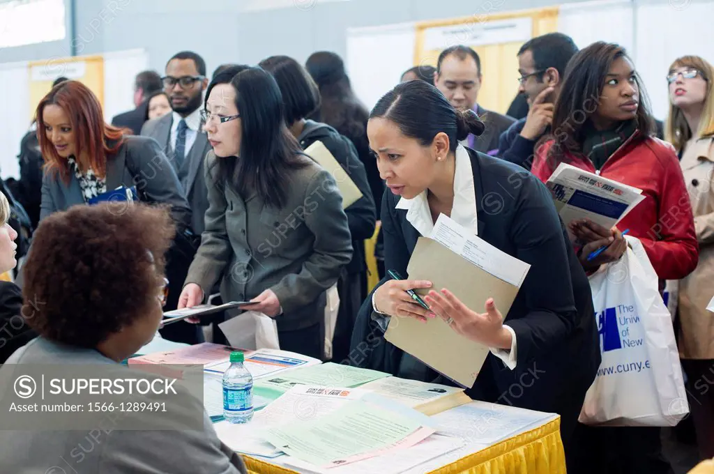 Job seekers attend the CUNY Big Apple Job and Internship Fair at the Jacob Javits Convention Center in New York. The US Labor Department reports new c...