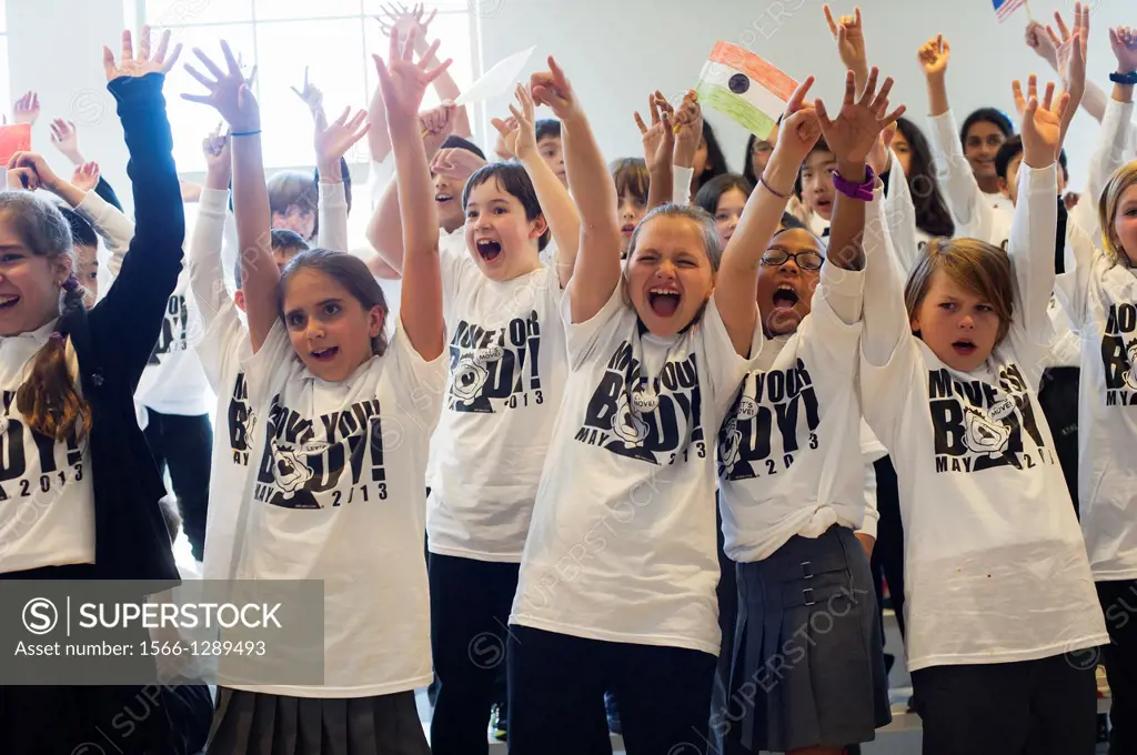 Exercisers participate in the Move Your Body campaign in Avenues The World School in Chelsea in New York. The campaign was launched by the WAT-AAH! Fo...