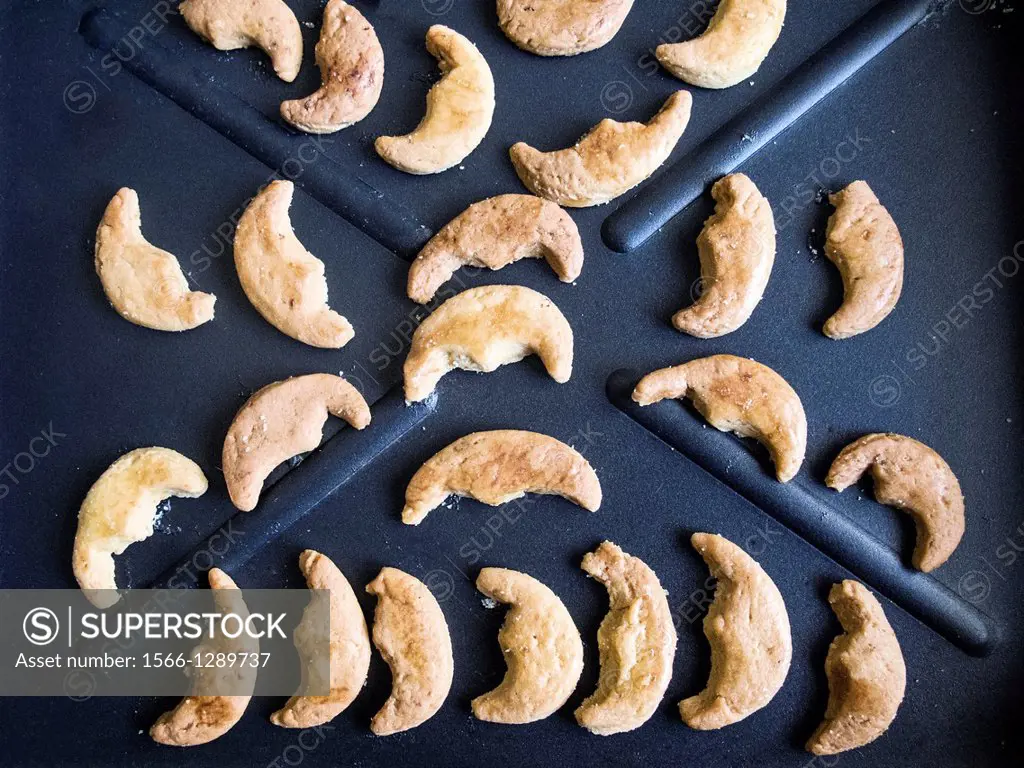 Small Half Moon shaped Greek Cookies, Koulourakia, on Baking Tray.