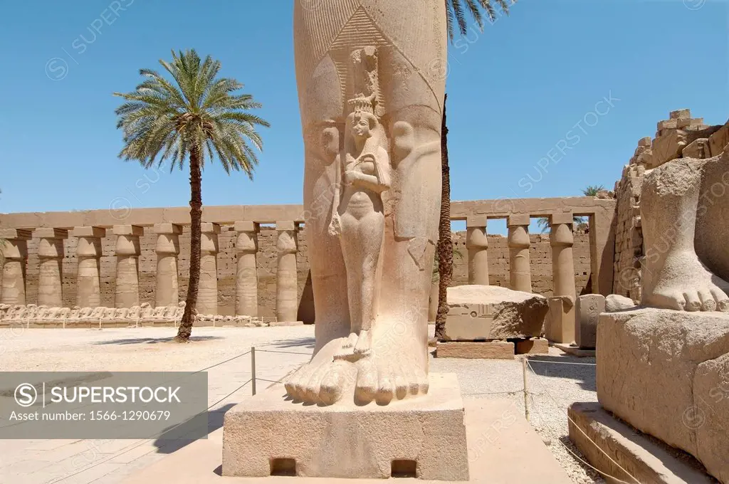Statue of Ramses II with his daughter Meritamen, Karnak Temple Complex, Luxor (Thebes), Egypt, Africa.