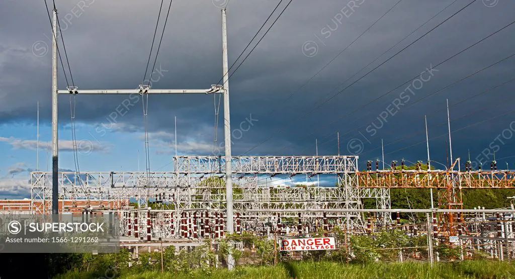 Electrical sub-station in Woburn, MA where the electric current's voltage is stepped up and re-distributed through suspended transmission lines.