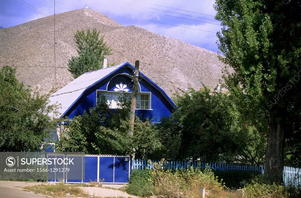 Issyk Kul Lake; blue coloured House; Datscha; Kyrgyzstan.