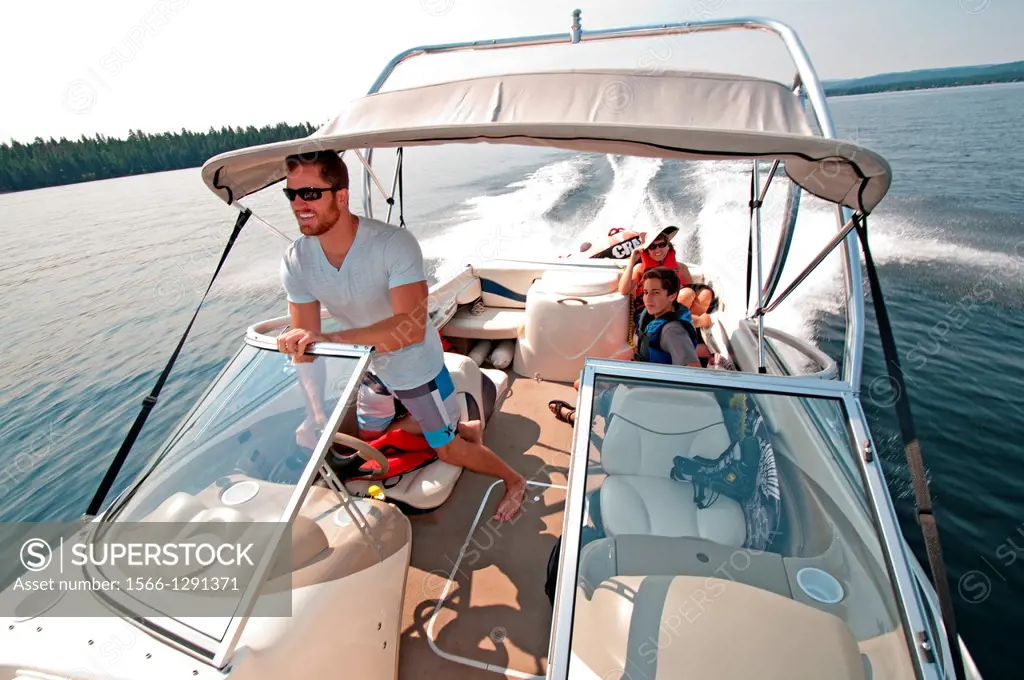 Boating on Payette Lake near the city of McCall in central Idaho