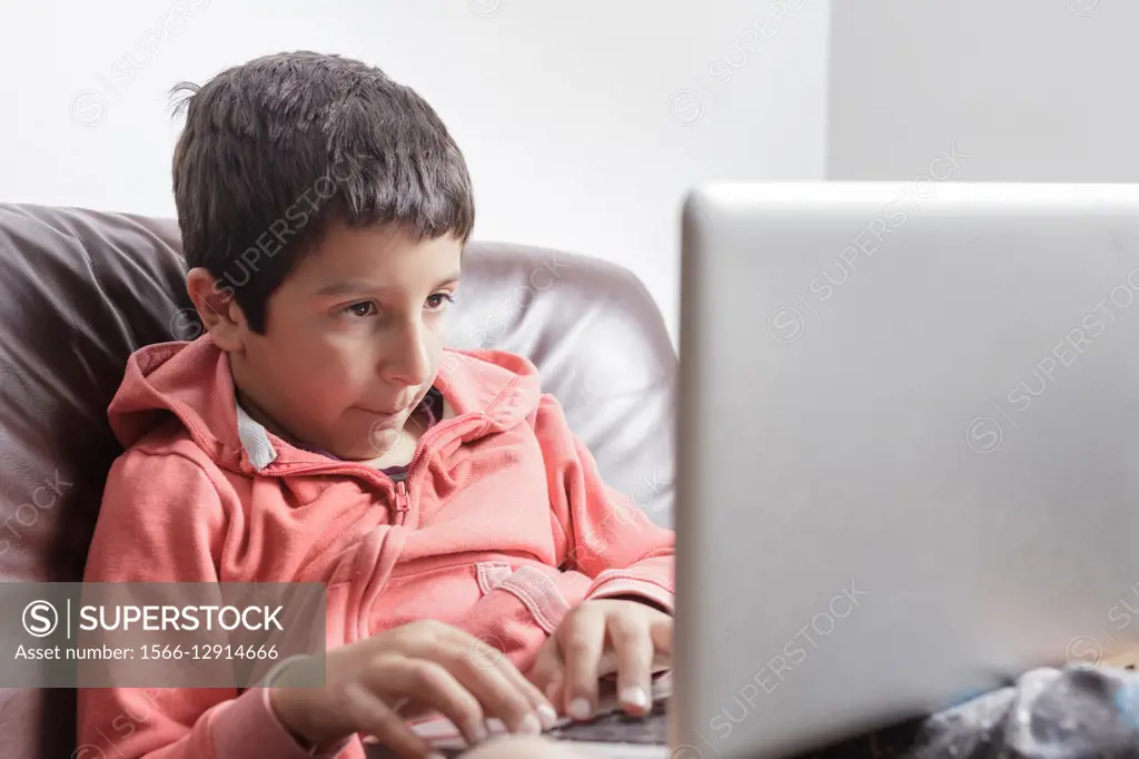 Child on computer.