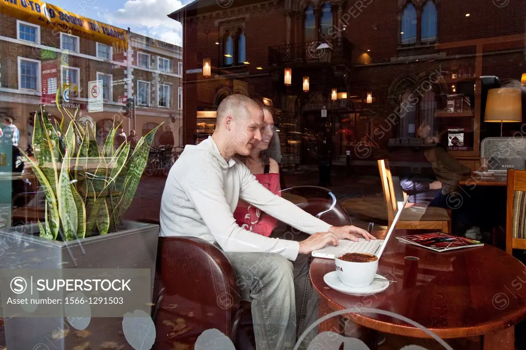 Young Couple in a Coffee Shop, Lewes, Sussex, England