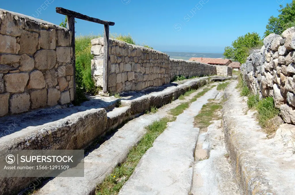Deep rut in the road, Cufut Qale, Chufut-Kale Jewish Fortress Crimea, Ukraine, Eastern Europe.