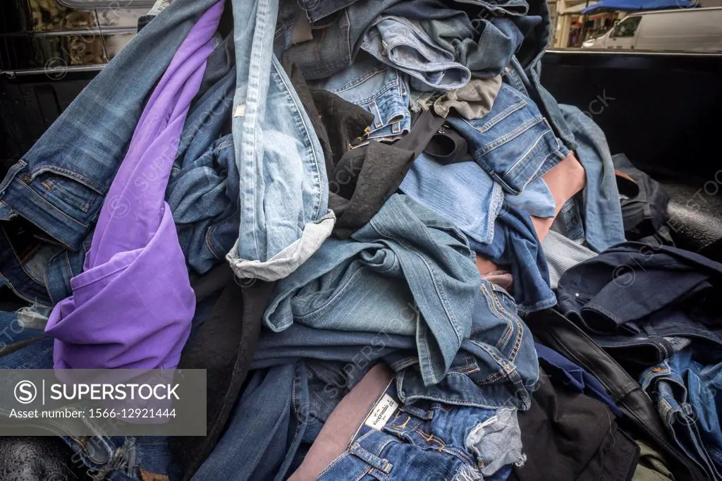 A bin of donated denim for recycling outside of a Madewell store in New York on Friday, October 9, 2015. Madewell is collecting old denim to be recycl...