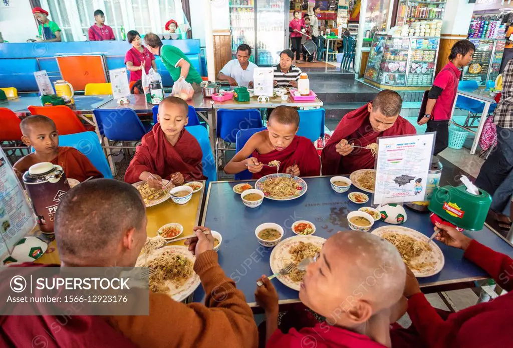 Myanmar , Pegu province , monks at a restaurant.