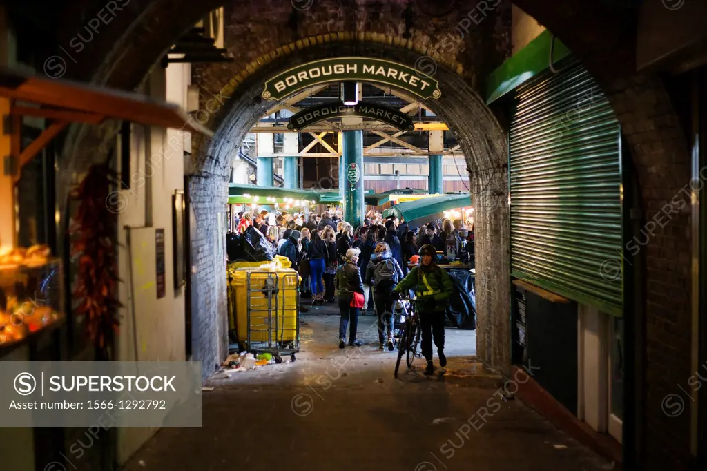 Busy Borough Market from a tunnel, Borough Market, London, UK