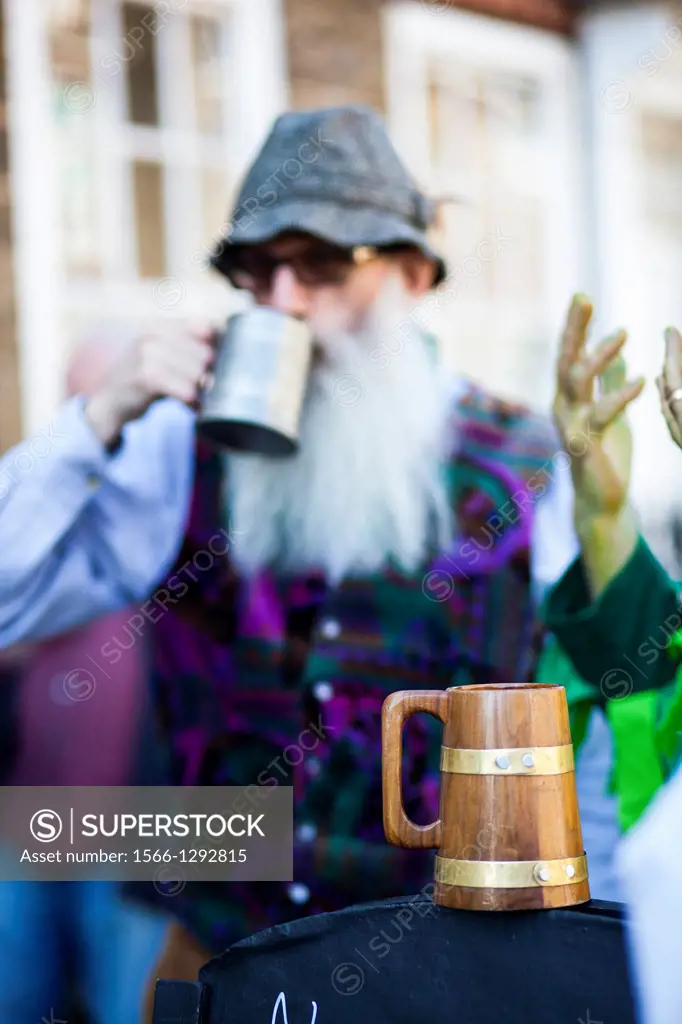 Beard man and detail of an old mug/jug beer pint, Deptford Jack, London, UK