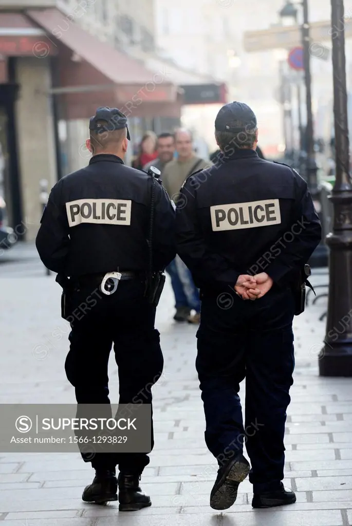 Policemen walking near Notre Dame in Paris,France,Europe.