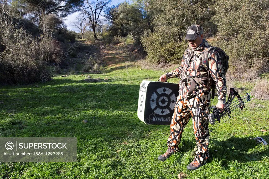 Spain , Castilla La Mancha , surroundings of Guadalajara , Bow hunting , compound bow ,training on target.