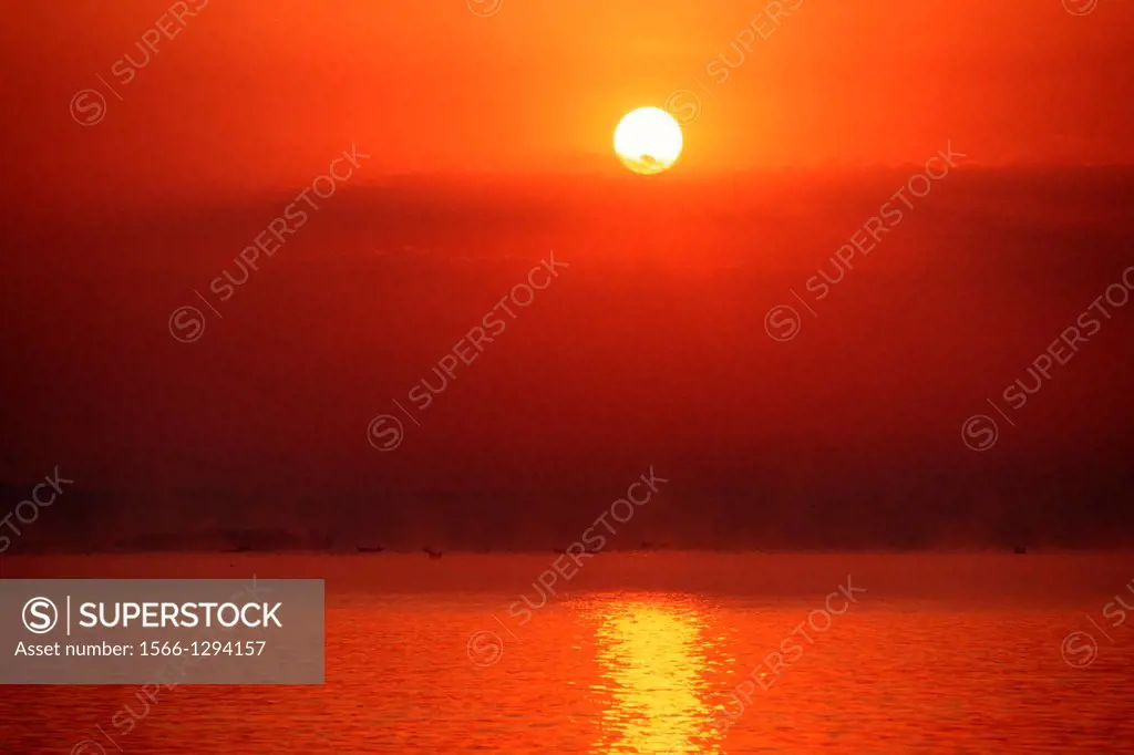 Lake Victoria; Sunrise; Fisher Boats in the morning Haze; Uganda.