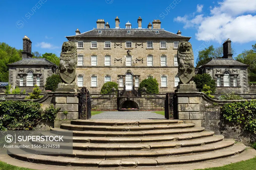 Front facade of Pollok House, Glasgow, Scotland, showing the access steps with the gatepost lions. This shows the original 18th century building with ...
