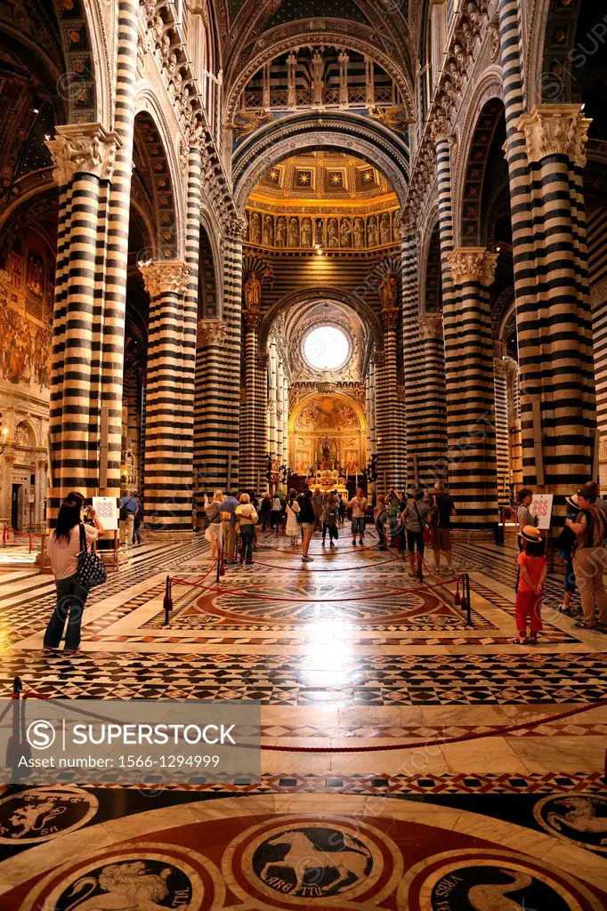 The interior of the duomo in Siena Italy.