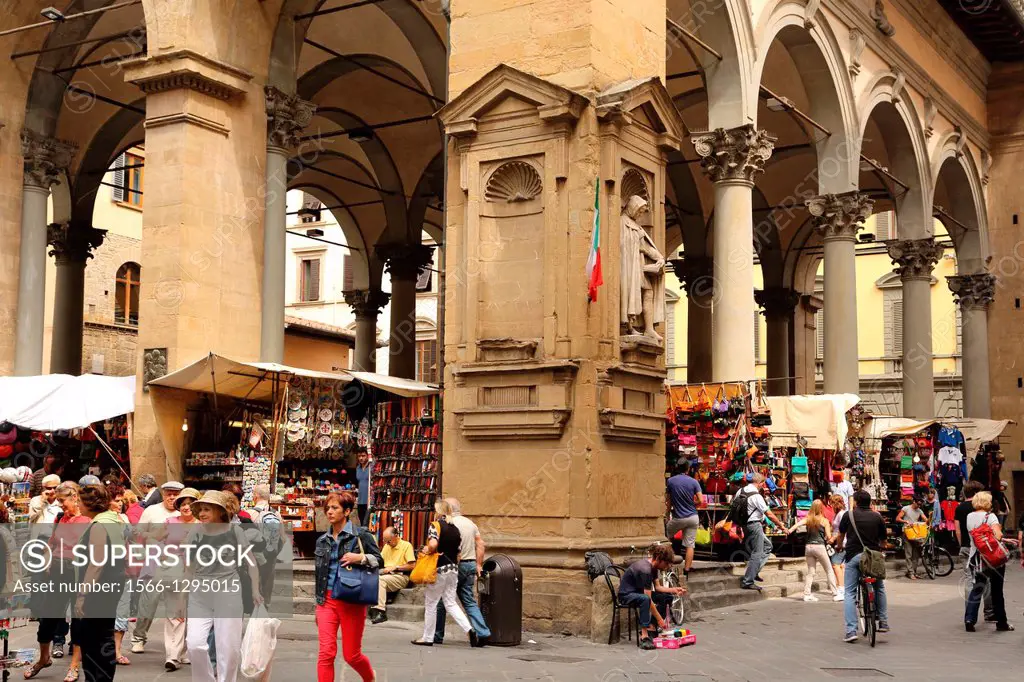 The Loggia del Mercato Nuovo has a market selling leather goods and souvenirs and is a popular tourist destination in Florence.