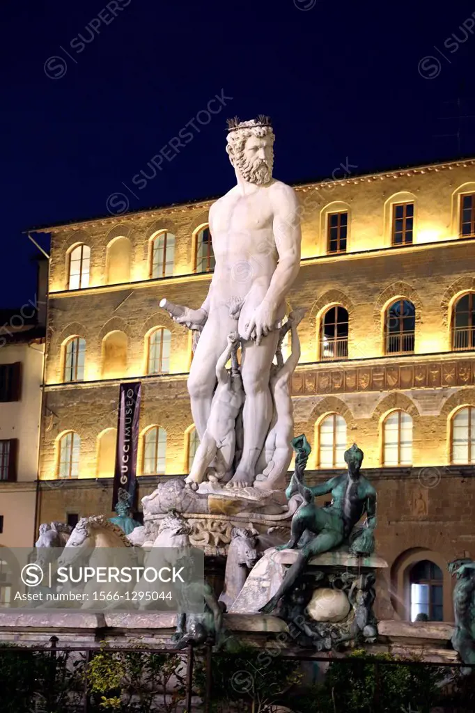 Replica statue of David in Piazza della Signoria at night in Florence Italy.