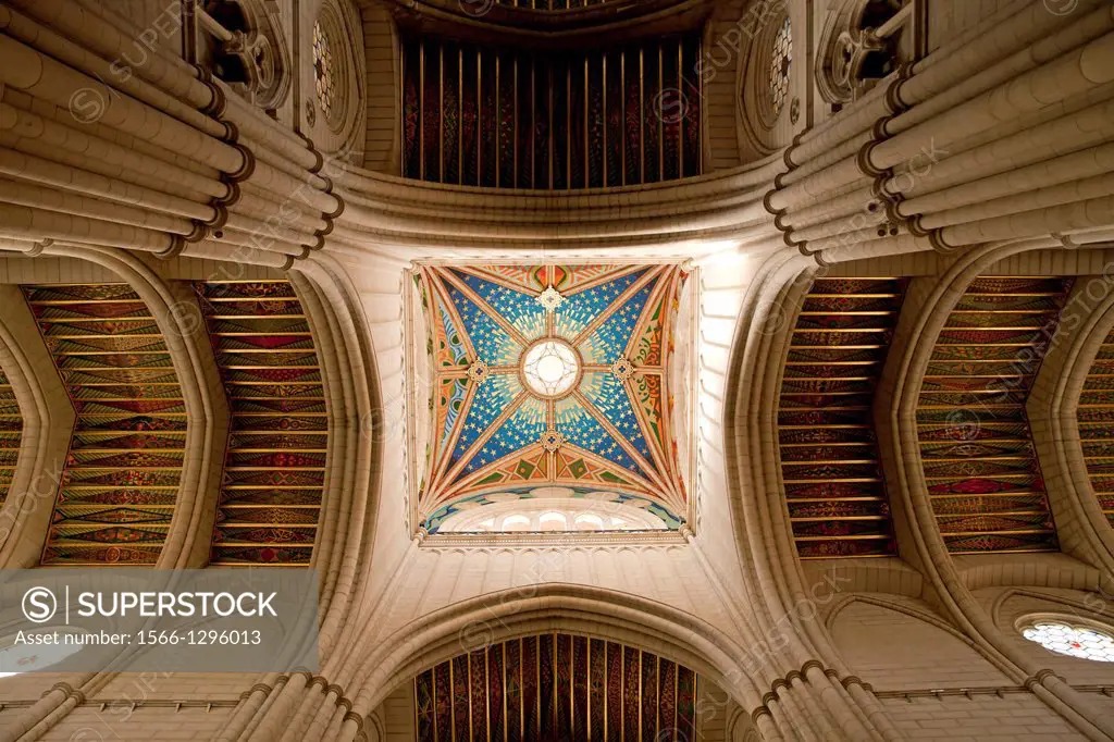 colourful ceiling of the catholic Almudena Cathedral Santa Maria la Real de La Almudena in Madrid, Spain, Europe.