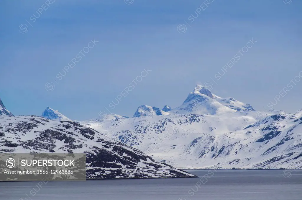 Greenland, Nuuk, Nuuk Harbor, snow covered mountains.