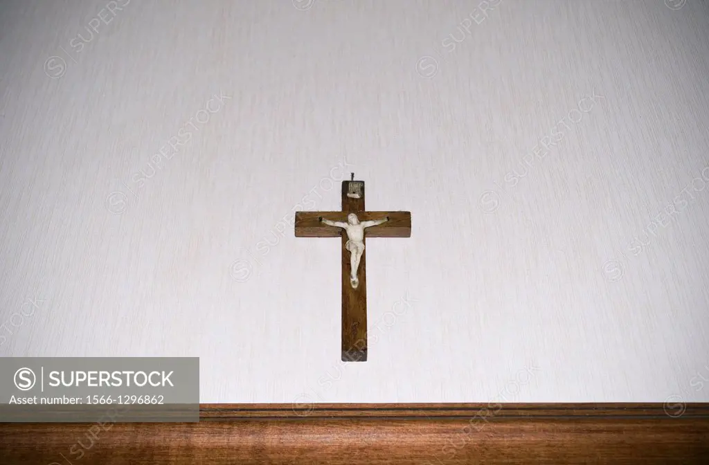 Crucifix hanged on wall.