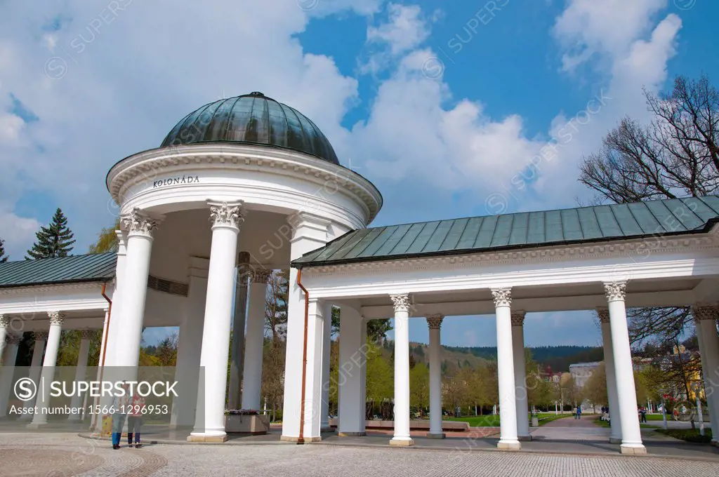Neoclassical style Kolonada the colonnades (1869) at Karolinin pramen spring in Spa Gardens park Marianske Lazne aka Marienbad spa town Czech Republic...