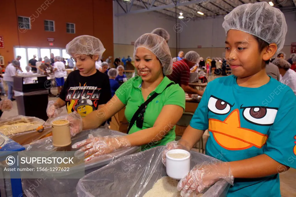 Florida, Miami, Miami-Dade County Fair And Expo, Feed My Starving Children, volunteer, community service, packing, meals, Asian, woman, mother, boy, s...